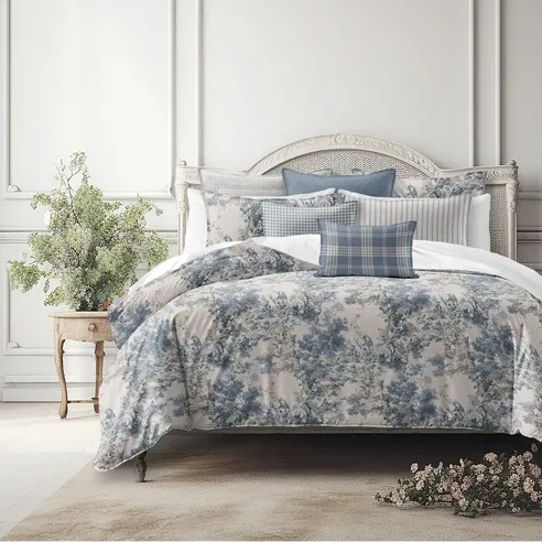 Dolce COVERLET set with painted forest design in soft blue, fog and fawn tones on bed, handcrafted in Canada