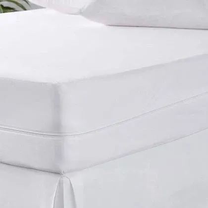 St. Genève Complete Mattress Encasement fitted on a mattress showing full 6-sided coverage and clean white finish