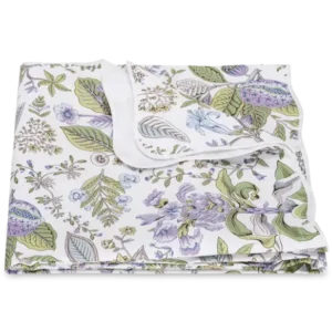 Matouk Pomegranate Schumacher duvet cover in white with lavender and green floral print.