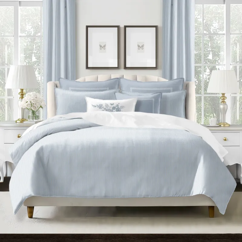 Ruben Stripe Cornflower Duvet Cover Set on bed – Made in Canada, 100% cotton twill