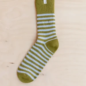 Single Cashmere & Merino Wool Socks in Olive & Blue Stripe by TBCo laid flat on wooden surface