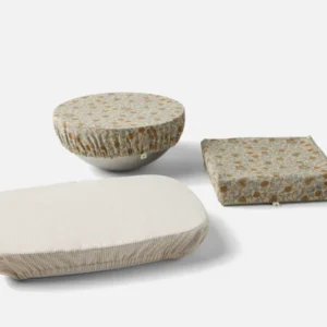 Coyuchi Conserve serving dish cover set in floral and stripe patterns, three sizes.