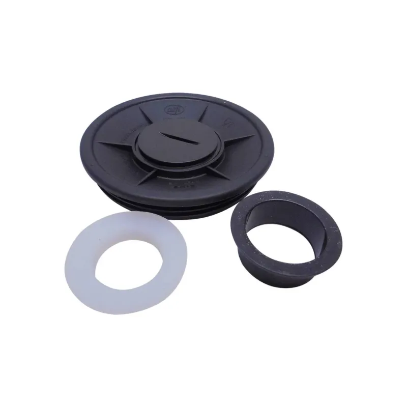 Das Bild zeigt drei runde technische Teile: eine große schwarze Scheibe mit mittigem Kreis, einen weißen Ring und einen kleineren schwarzen Zylinder. Sie liegen auf einem weißen Hintergrund.