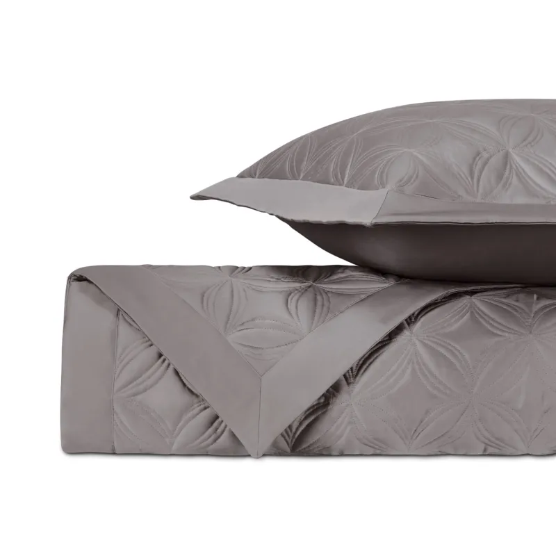 Home Treasures Dara quilted coverlet and euro sham set in slate gray floral pattern.