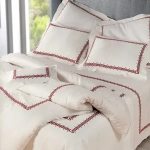 Dea Etruria fitted sheet in ivory with red Greek key embroidered border.