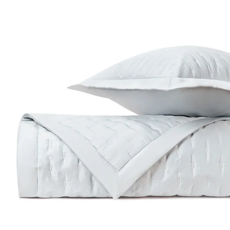 Home Treasures Fil Coupé Modal quilted coverlet and euro sham in pale blue and white.