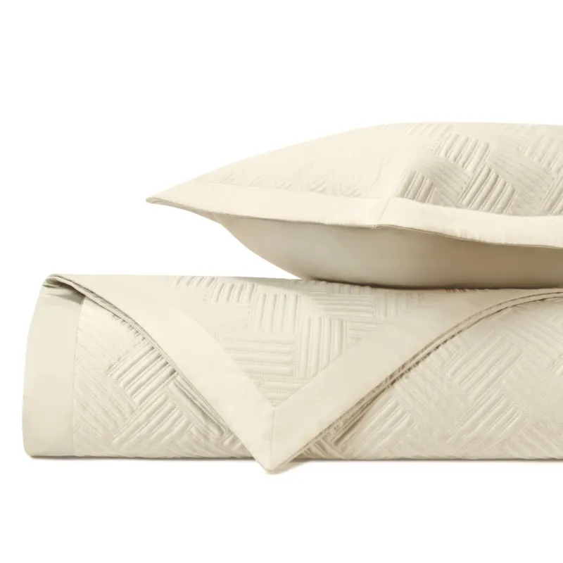 Home Treasures Twilight ivory quilted coverlet and sham set with geometric pattern.